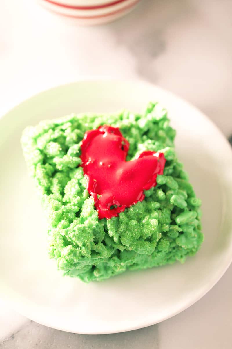 piece of grinch marshmallow treat on a white plate 
