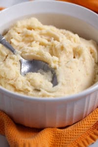 a bowl of creamy slow cooker mashed potatoes