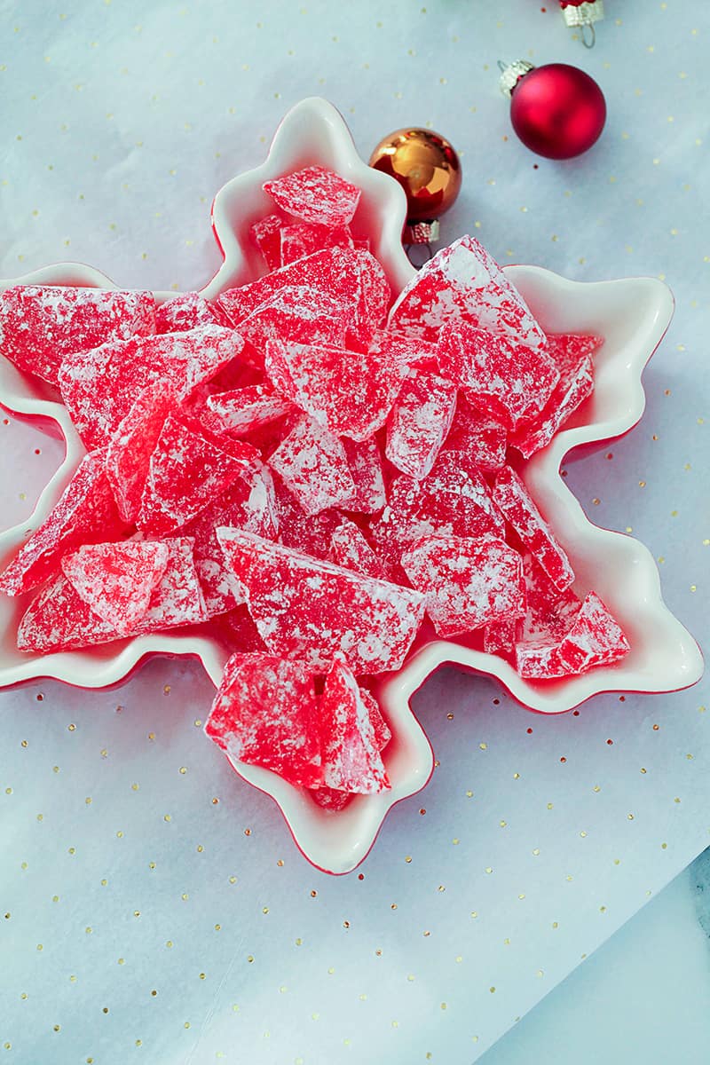 aerial view of snowflake candy dish full of cinnamon hard rock candy