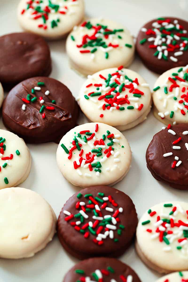 variety of milk and white chocolate covered cookies with red, green & white sprinkles