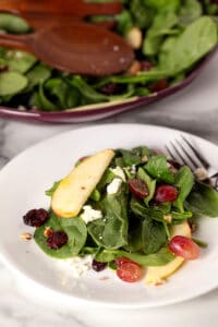 individual serving of autumn spinach salad