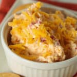 Ramekin with pimento cheese and round butter crackers